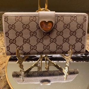 Authentic GUCCI CANVAS AND LEATHER WITH GOLD TONE DETAILS WALLET. EXCELLENT
